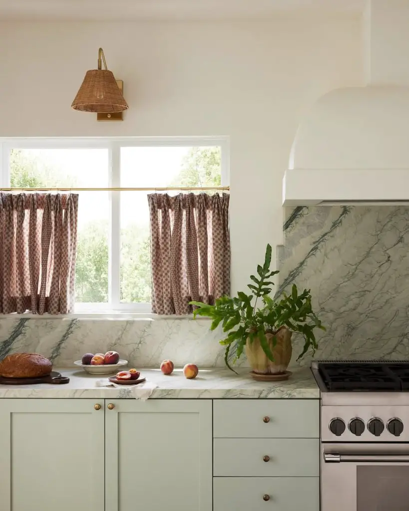 Charming curtains above kitchen sink