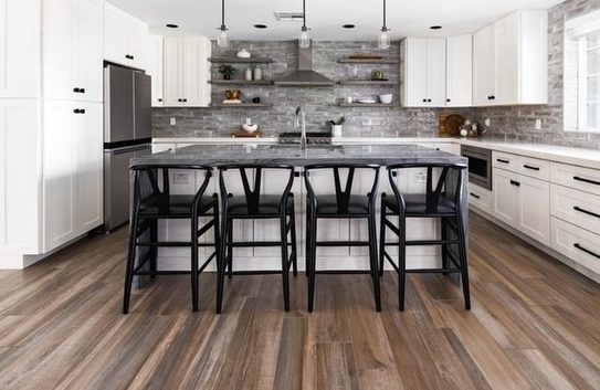 Modern white kitchen with black accents