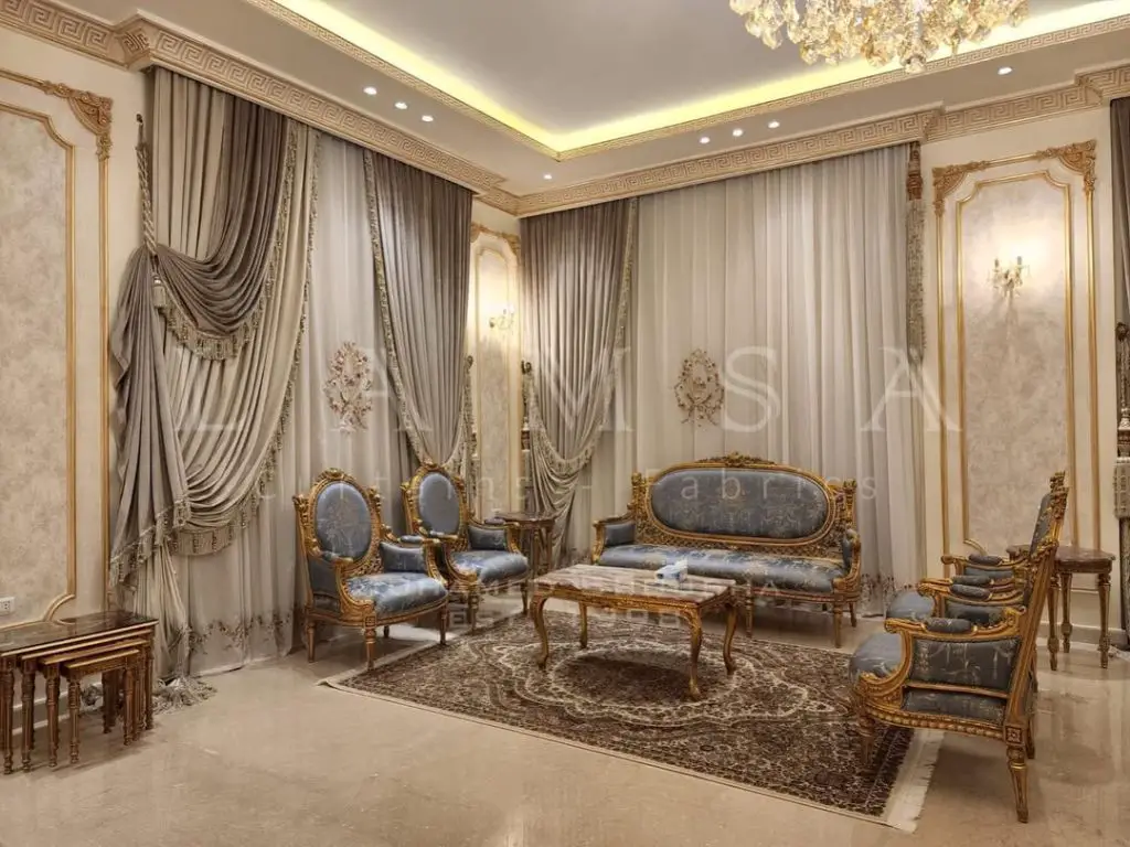 Luxurious living room with elegant blue and gold drapery and ornate furniture
