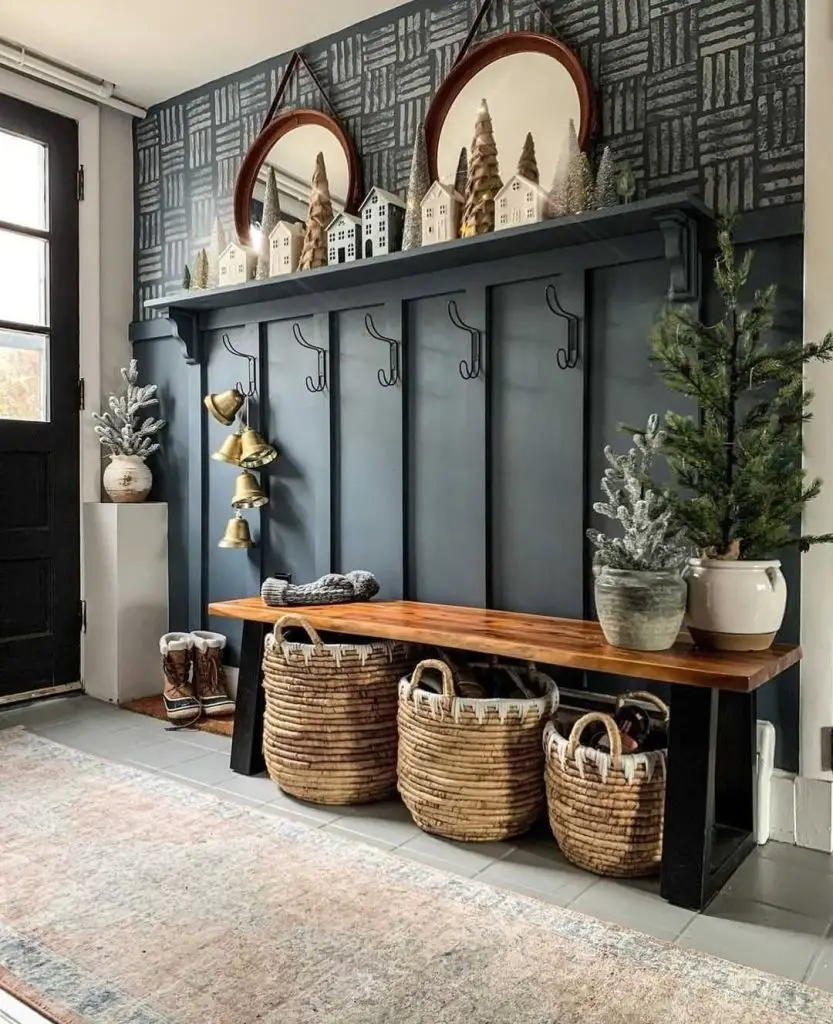 Stylish entryway with hooks, a bench, and holiday decorations