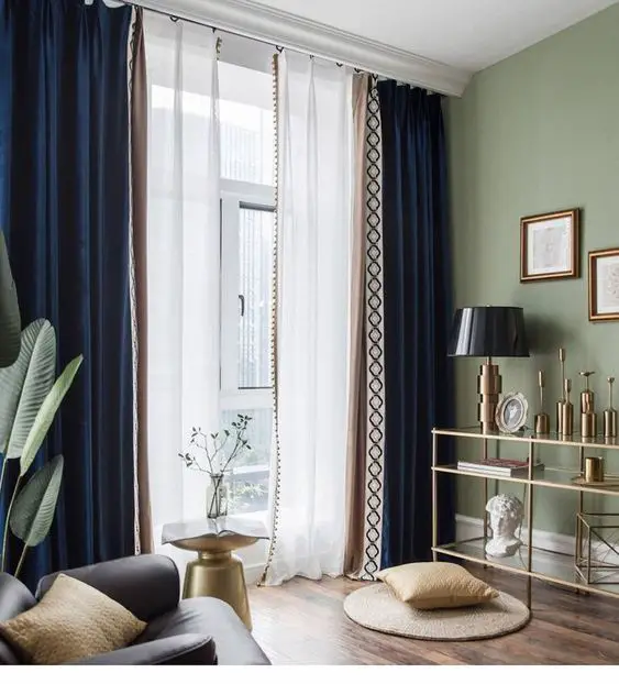 Chic living room with navy and beige curtains, modern decor, and a cozy atmosphere
