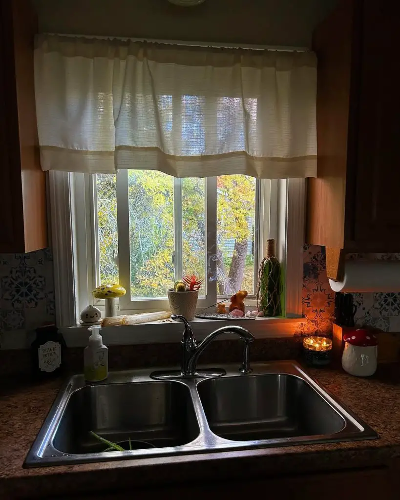 Cozy kitchen with soft curtains and decor