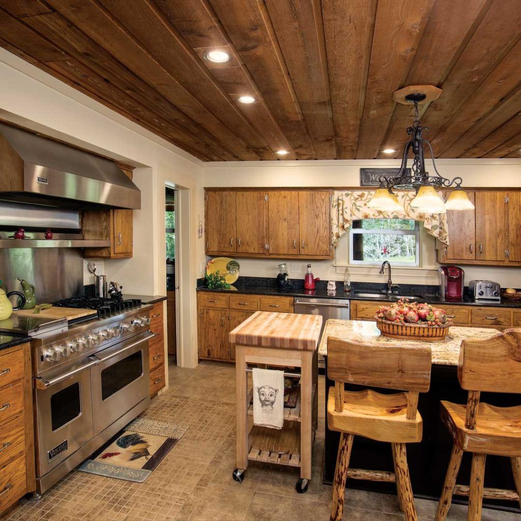 Rustic kitchen with wooden cabinets and island seating