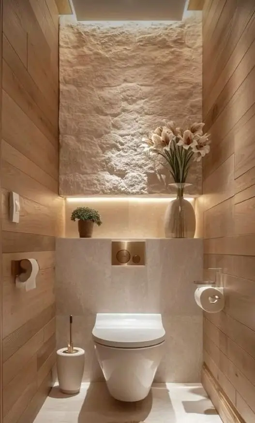 Modern powder room with stone wall wooden panels and floating shelf with lilies