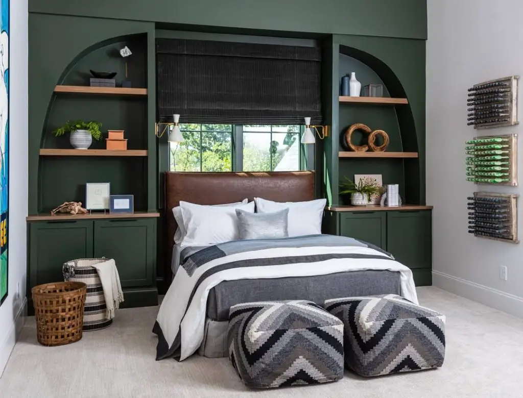 Green bedroom with stone arch vintage sofa and crystal chandelier