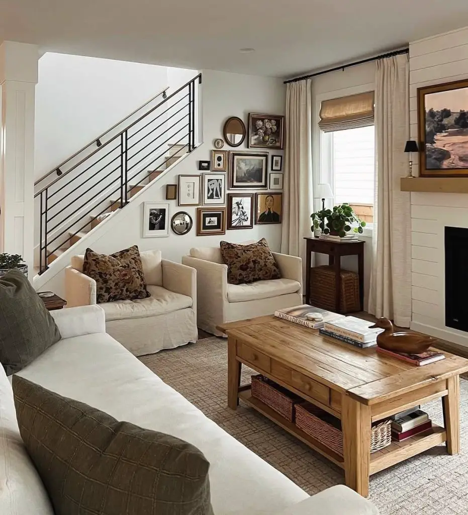 Cozy living room with gallery wall and cream colored furniture