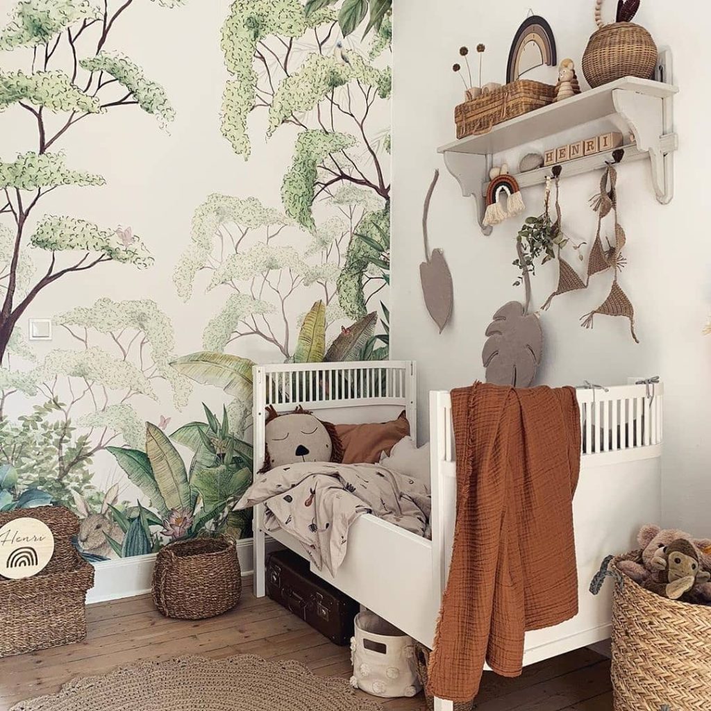 Twin bedroom with matching beds yellow quilts white dresser and blue walls