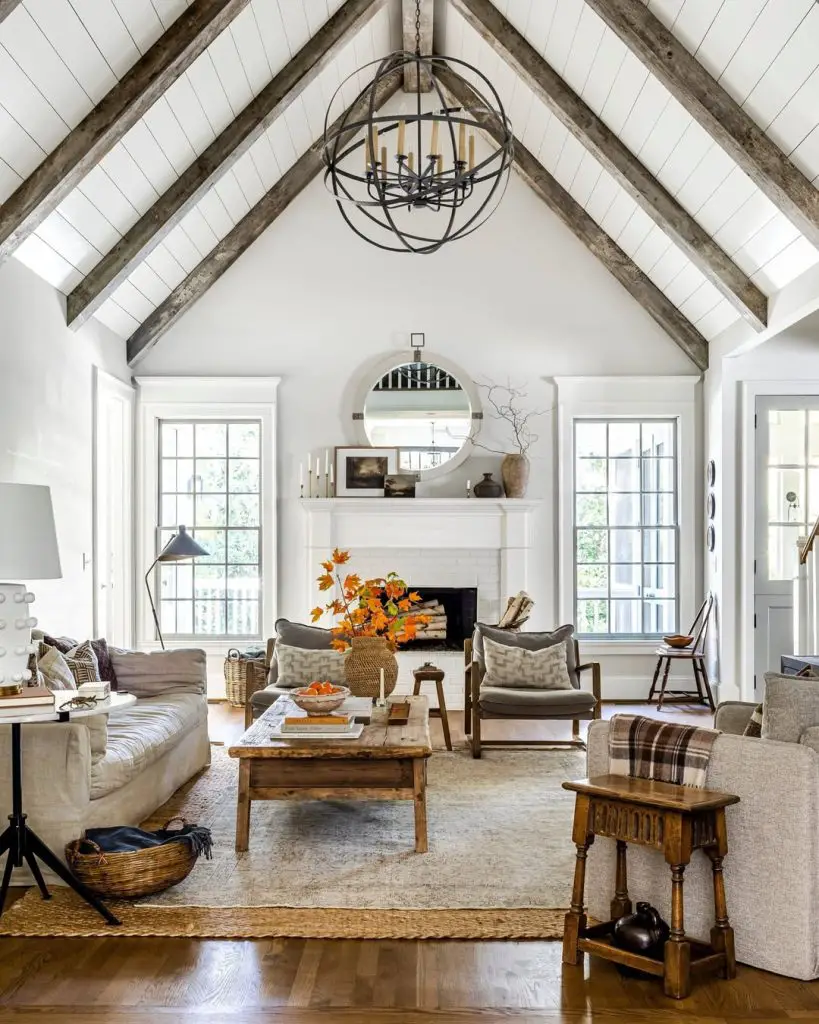 Living room with vaulted ceiling and rustic wooden beams