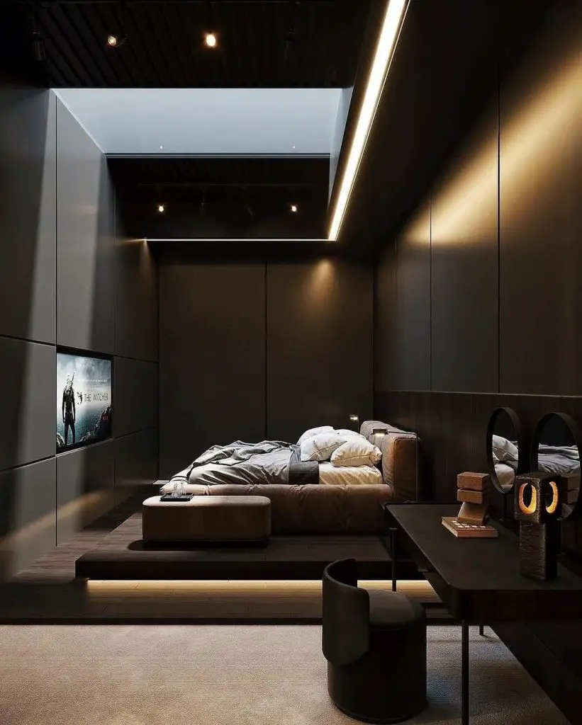 Dark home theater bedroom with floating LED lights and media wall