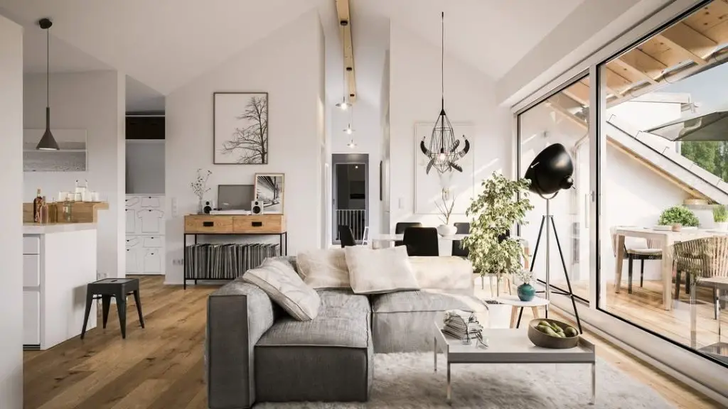 Modern attic living room with gray sofa and large windows