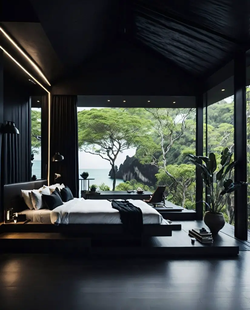 Luxurious dark bedroom overlooking dramatic coastal cliffs