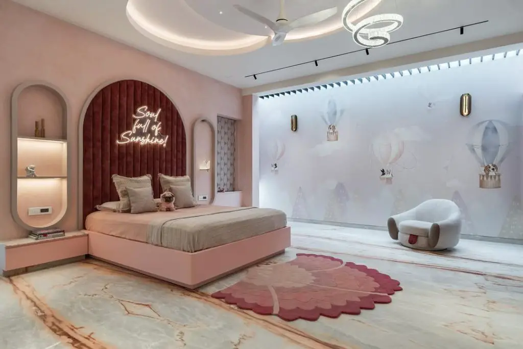 Modern pink bedroom with neon sign and balloon wallpaper