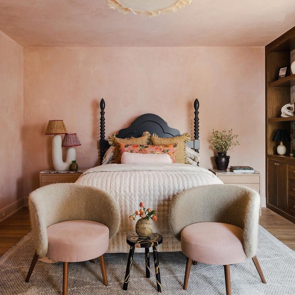 Modern pink bedroom with geometric lights and textured headboard