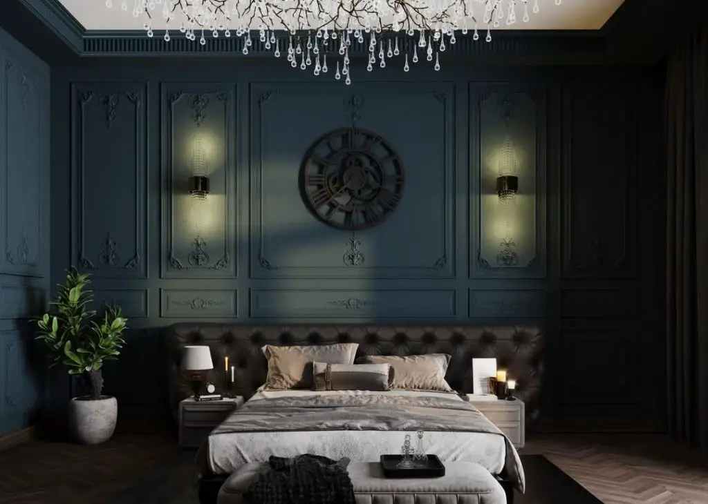 Dark teal bedroom with crystal chandelier and classic wall moldings