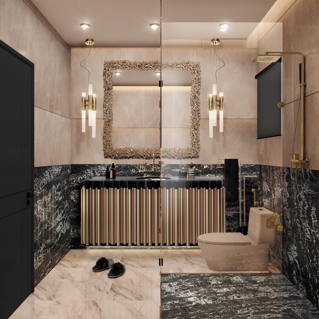 Luxurious bathroom with gold accents marble walls and decorative mirror