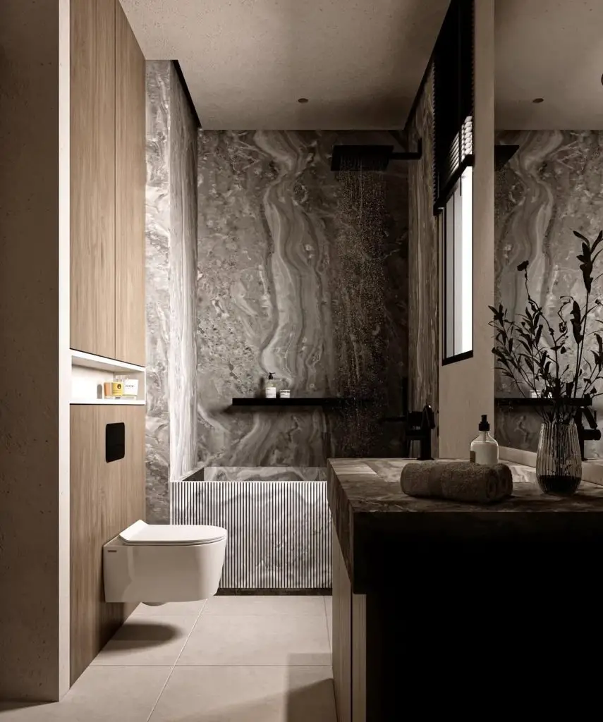 Minimalist bathroom with veined marble walls and wooden accents