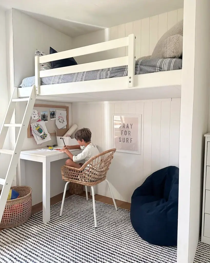 All white dorm room with textured bedding and minimal decor