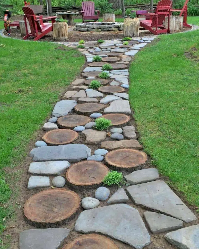 Illuminated garden path with white planters and string lights