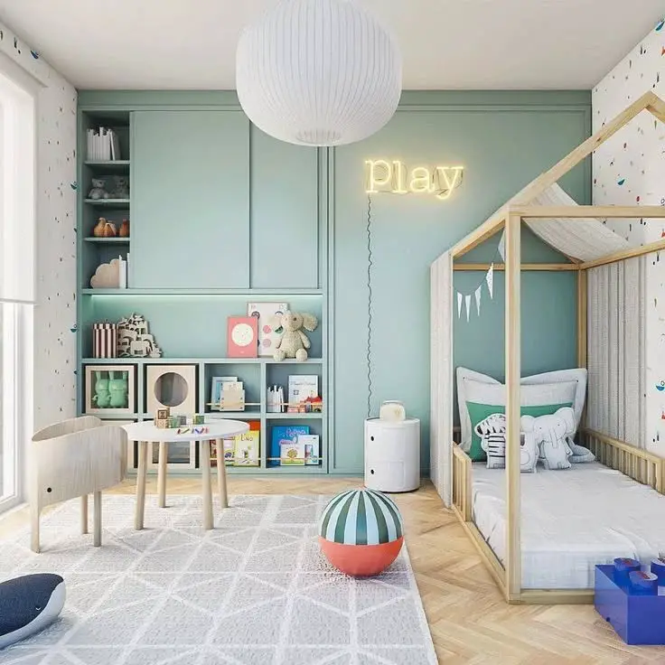 Mint green playroom with house frame bed built in storage and neon sign
