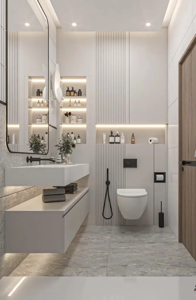 White minimalist bathroom with illuminated shelving and linear details