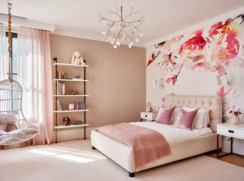 All pink bedroom with tufted bed and crystal accents
