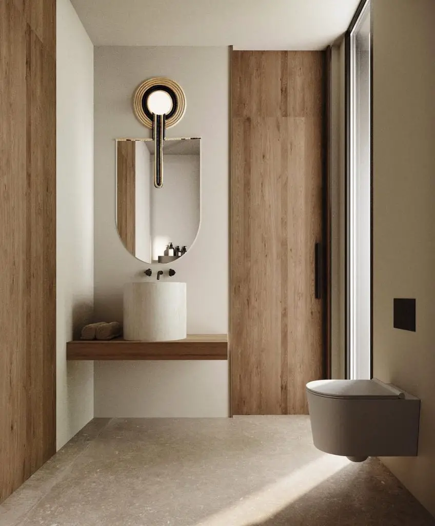 Modern bathroom with artistic mirror and wooden wall panels