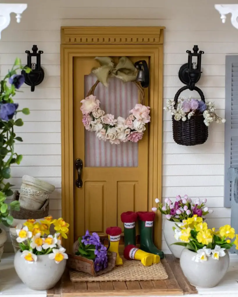 Window decorated with floral garland and vintage inspired elements