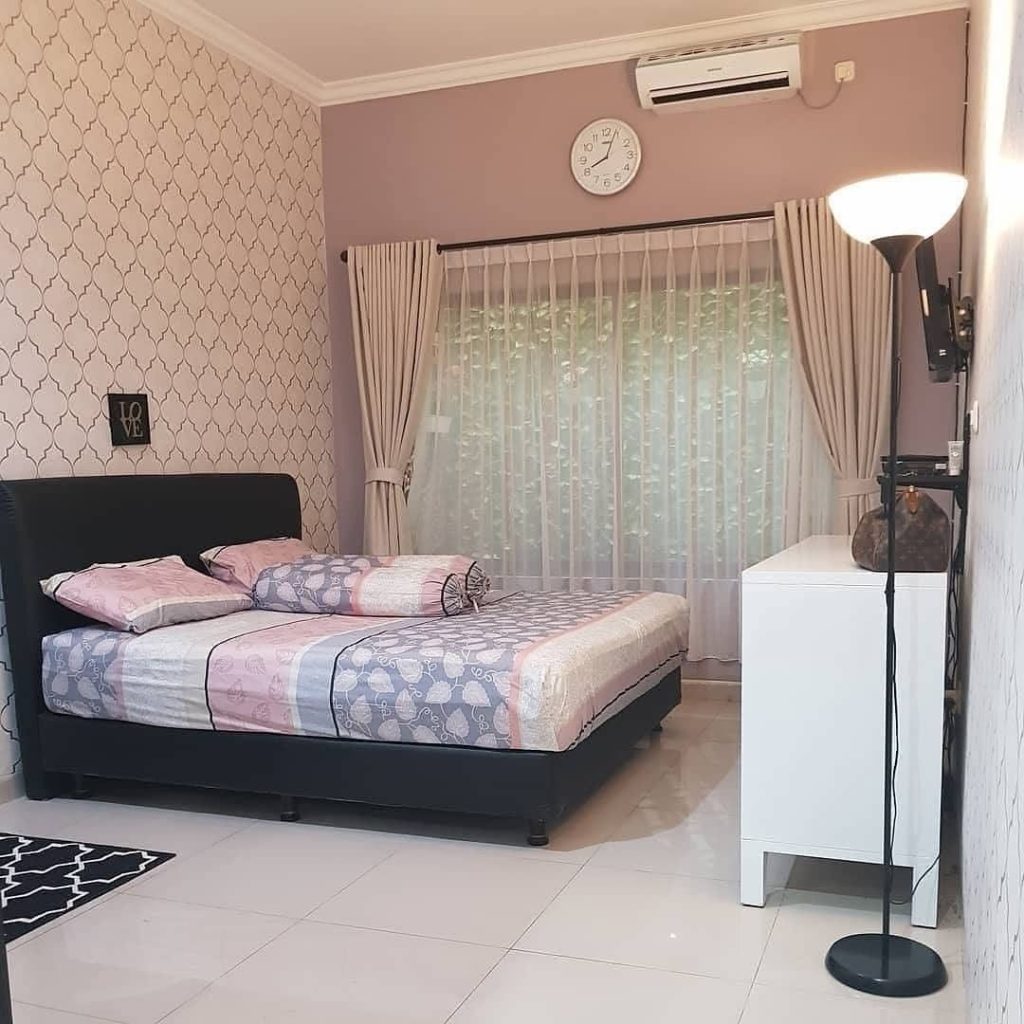 Retro bedroom with pink neon lights bookshelf and modern furniture