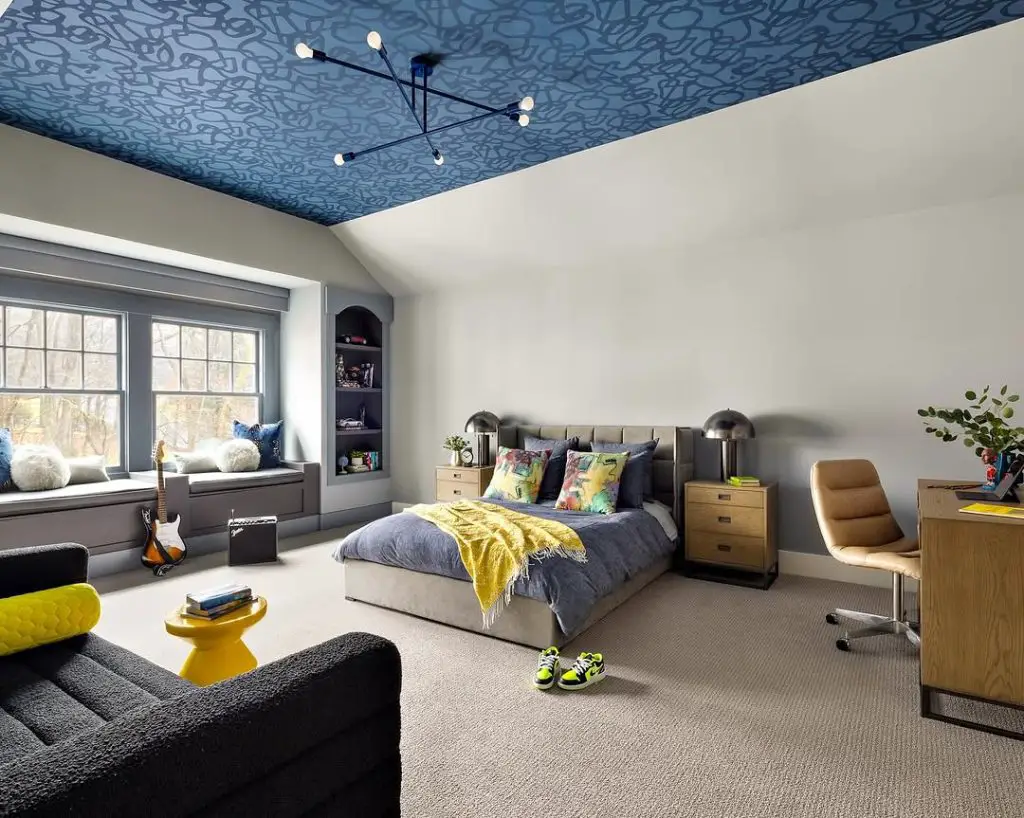 Space themed bedroom with navy accents and geometric patterns