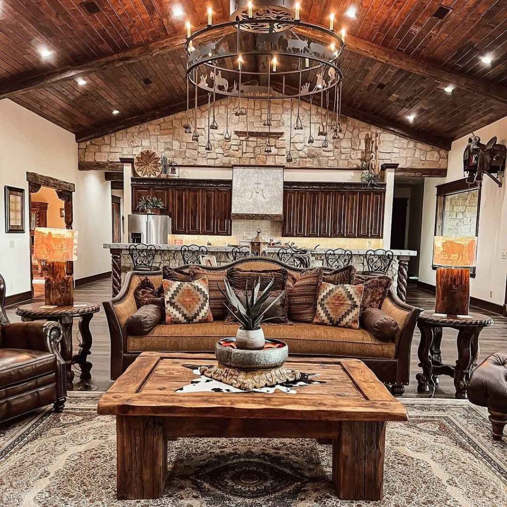 Western style living room with decorative chandelier leather furniture and stone accents