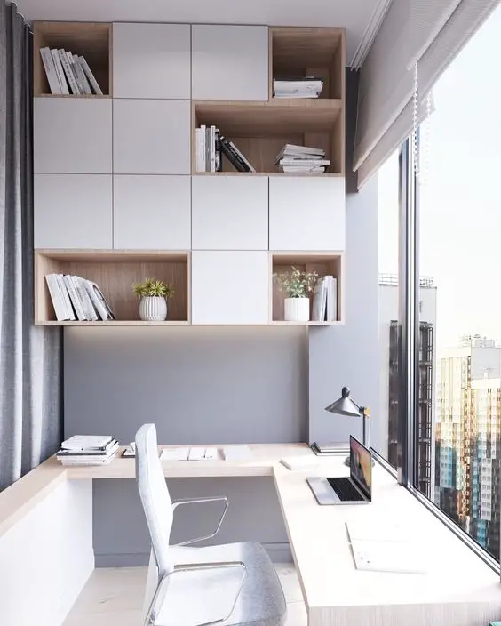 Modern office with desert views glass desk and geometric lighting