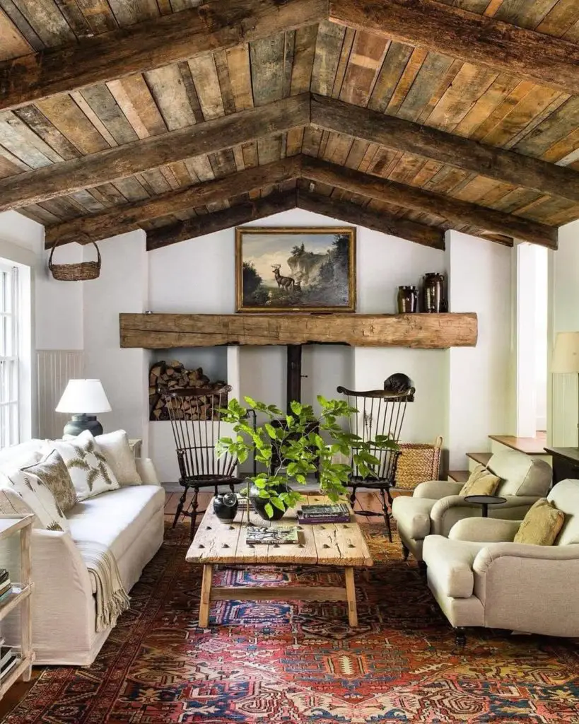 Rustic living room with wooden beams Persian rug and white sofa