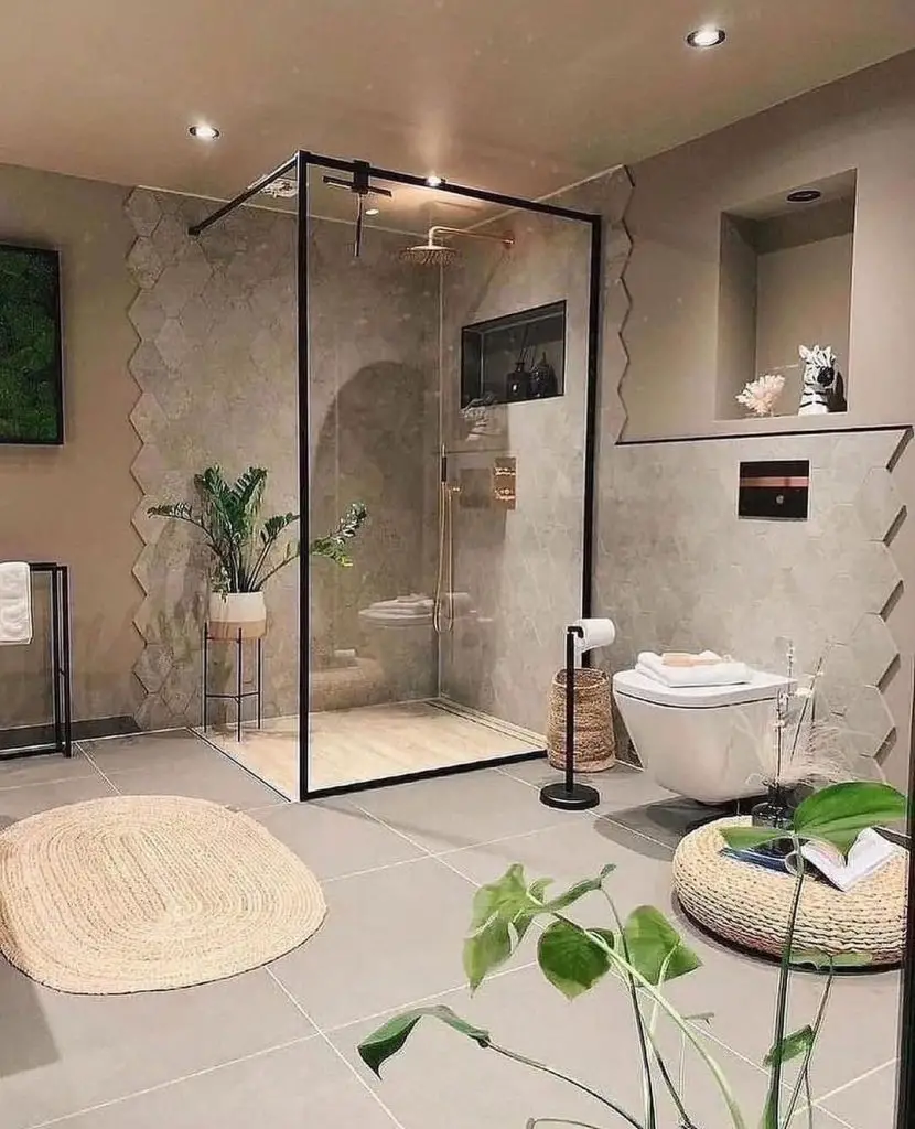 Contemporary bathroom with hexagonal wall pattern and black frame shower