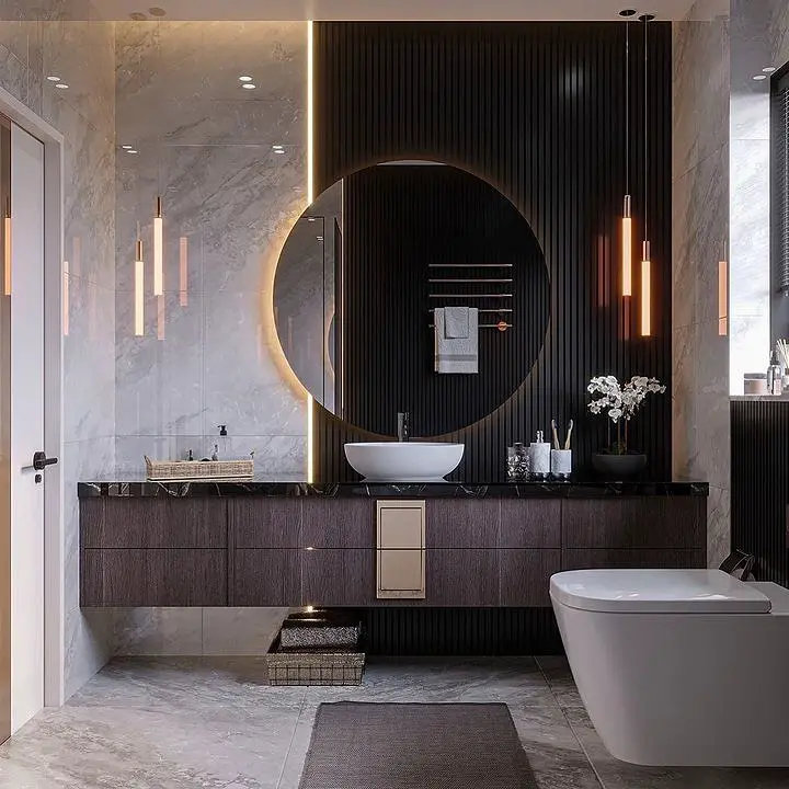 Modern bathroom with black panels circular illuminated mirror and floating vanity