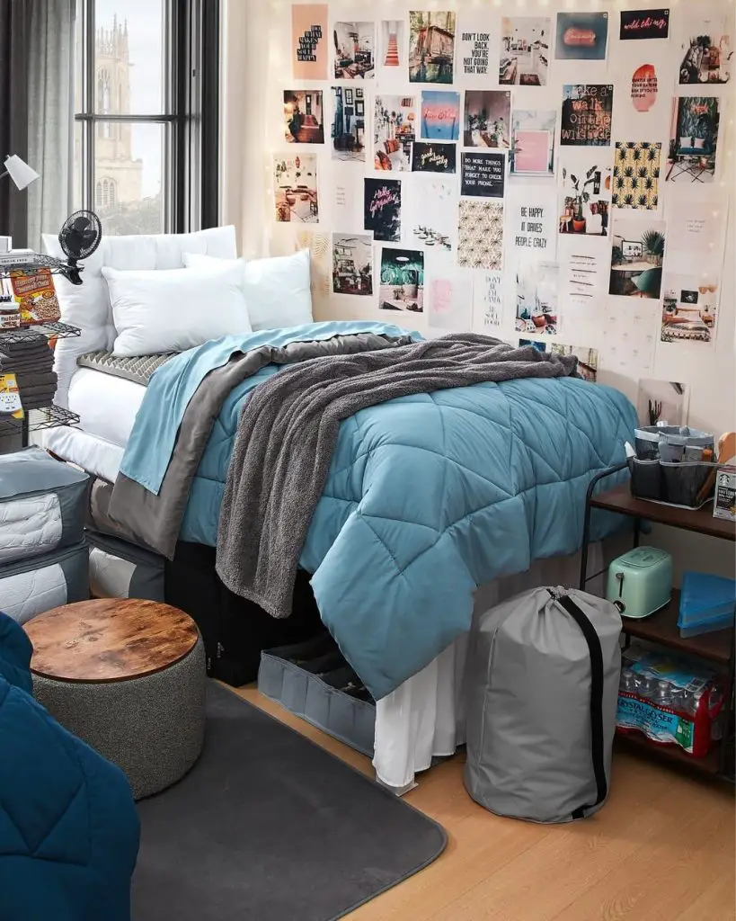 Striped bedding on loft bed with organized desk space below