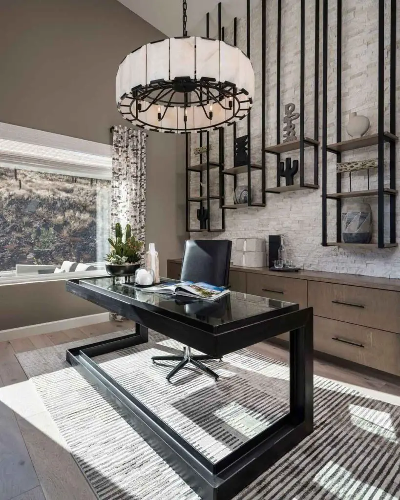 Clean modern office with white walls wooden desk and floating shelves