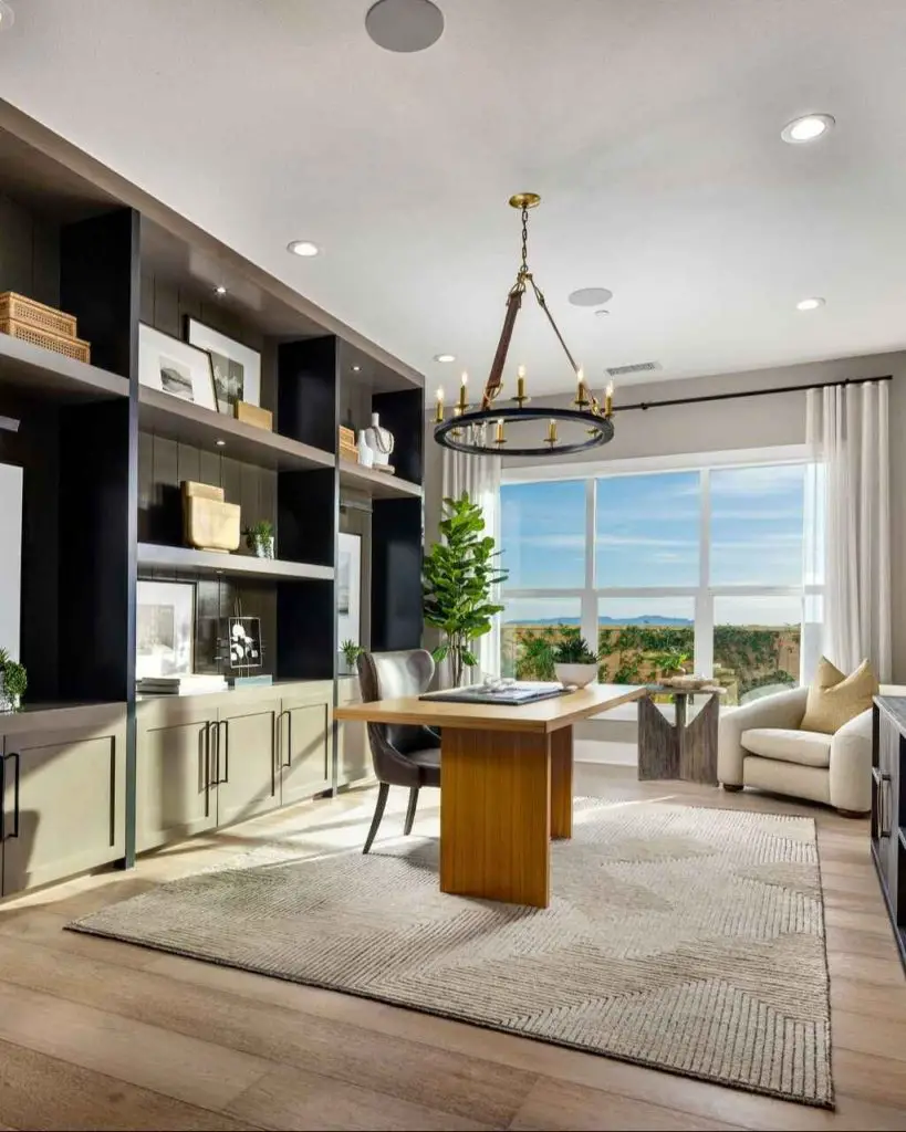 Modern studio with geometric details custom desk and statement lighting