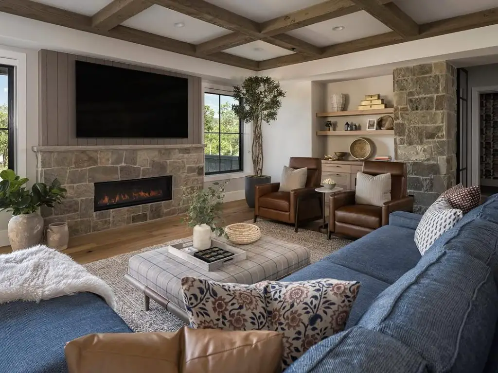 Modern mountain living room with stone fireplace coffered ceiling and scenic views