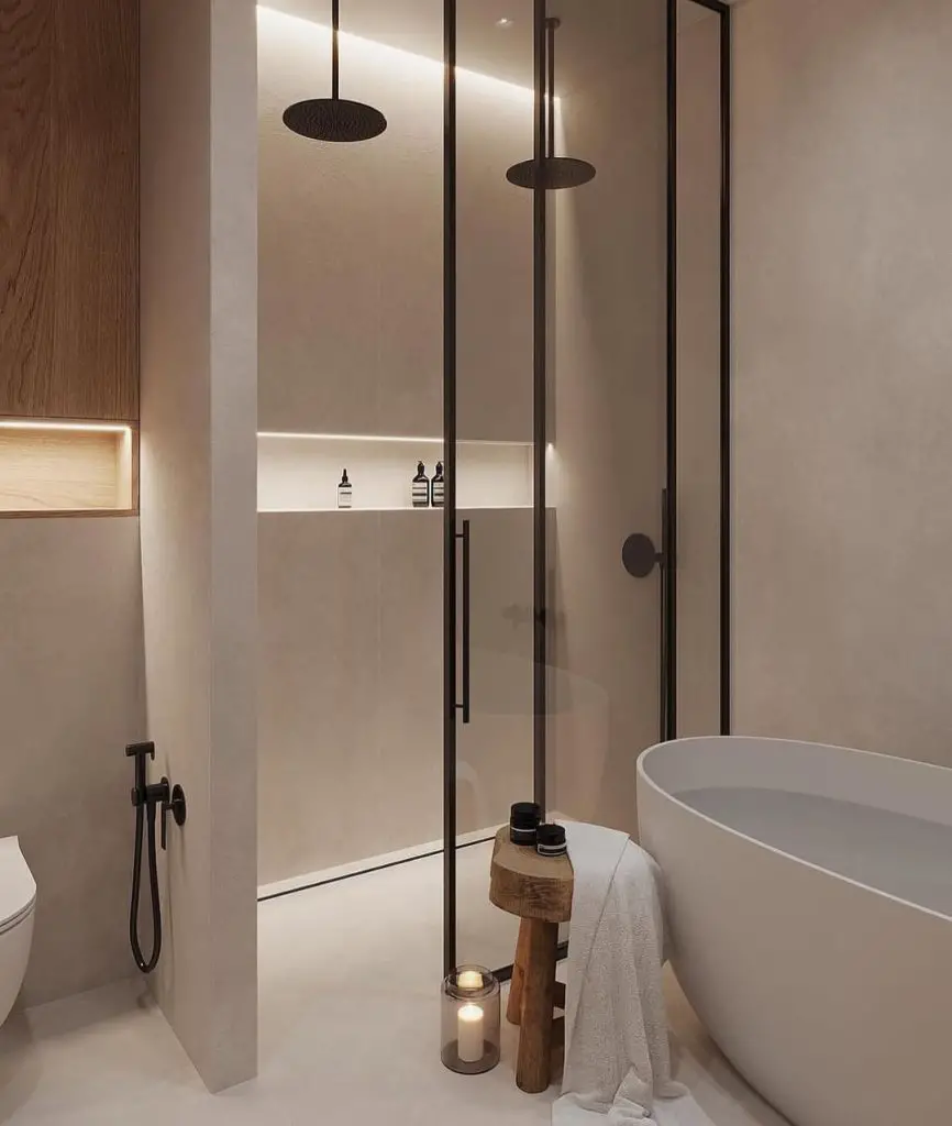 Beige bathroom with freestanding tub black fixtures and wooden accents