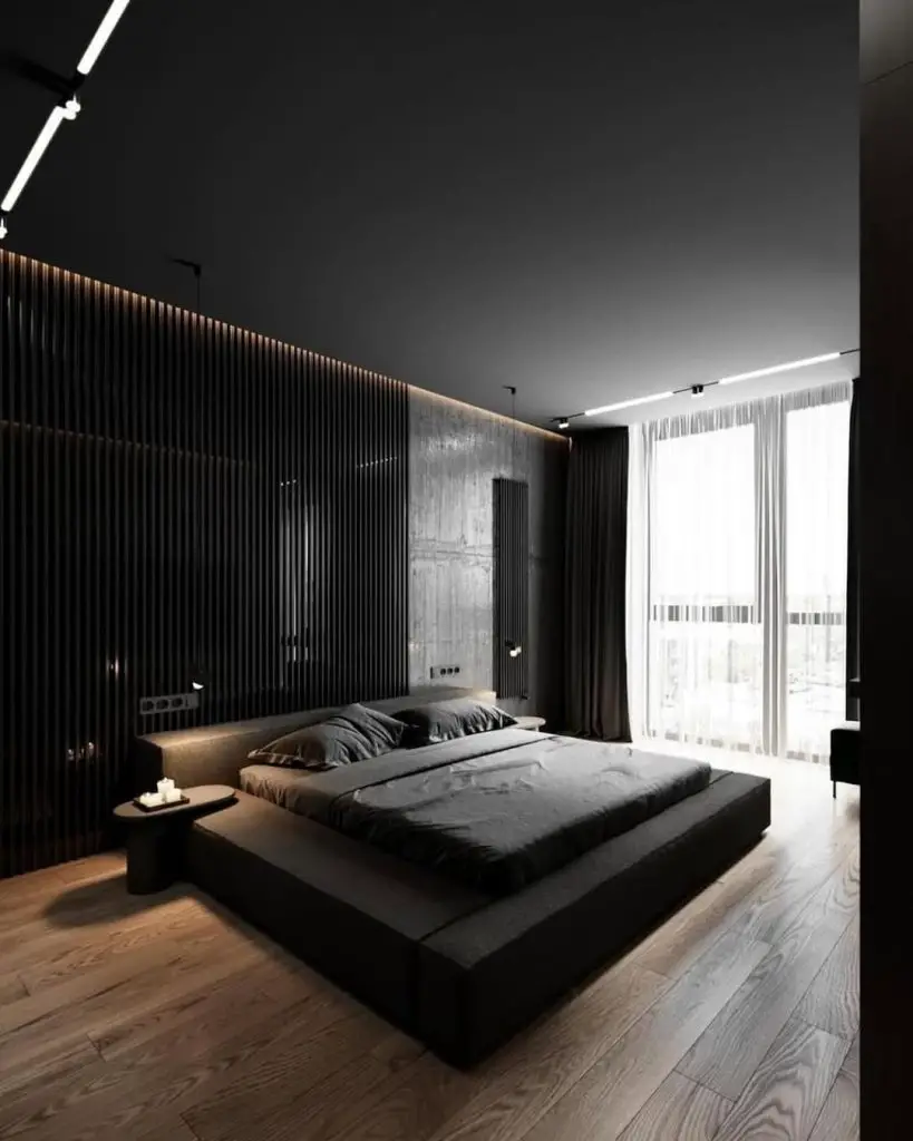 Dark bedroom with vertical panels and pendant lighting