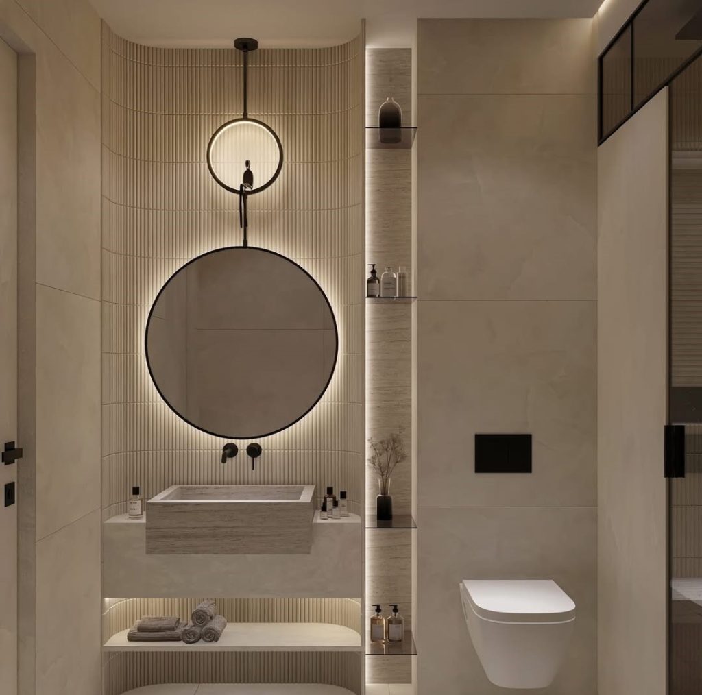 Contemporary bathroom with dual round mirrors stone sink and built in bench