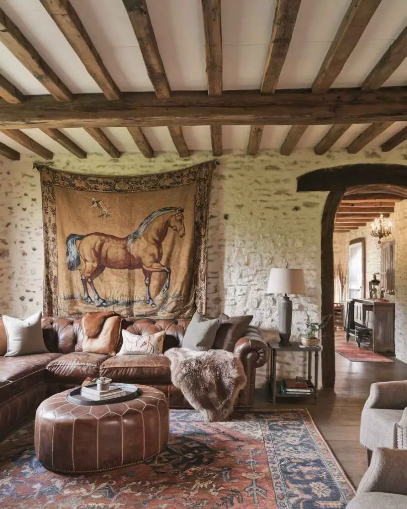 Living room with horse tapestry leather sofa and stone walls