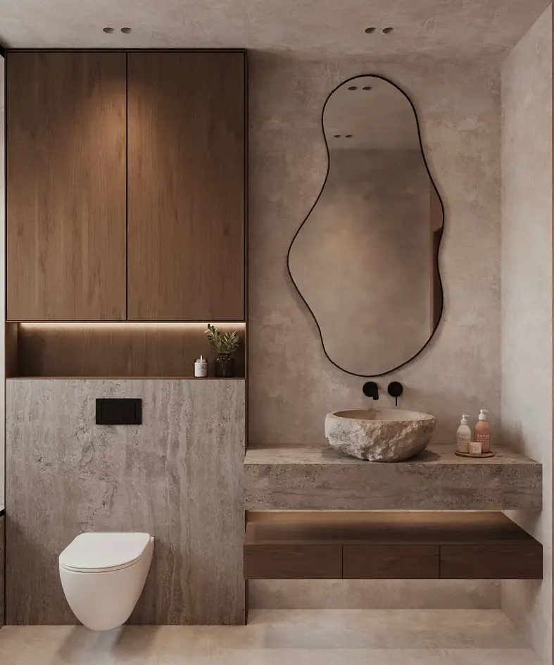 Contemporary bathroom with organic shaped mirror stone sink and concrete walls