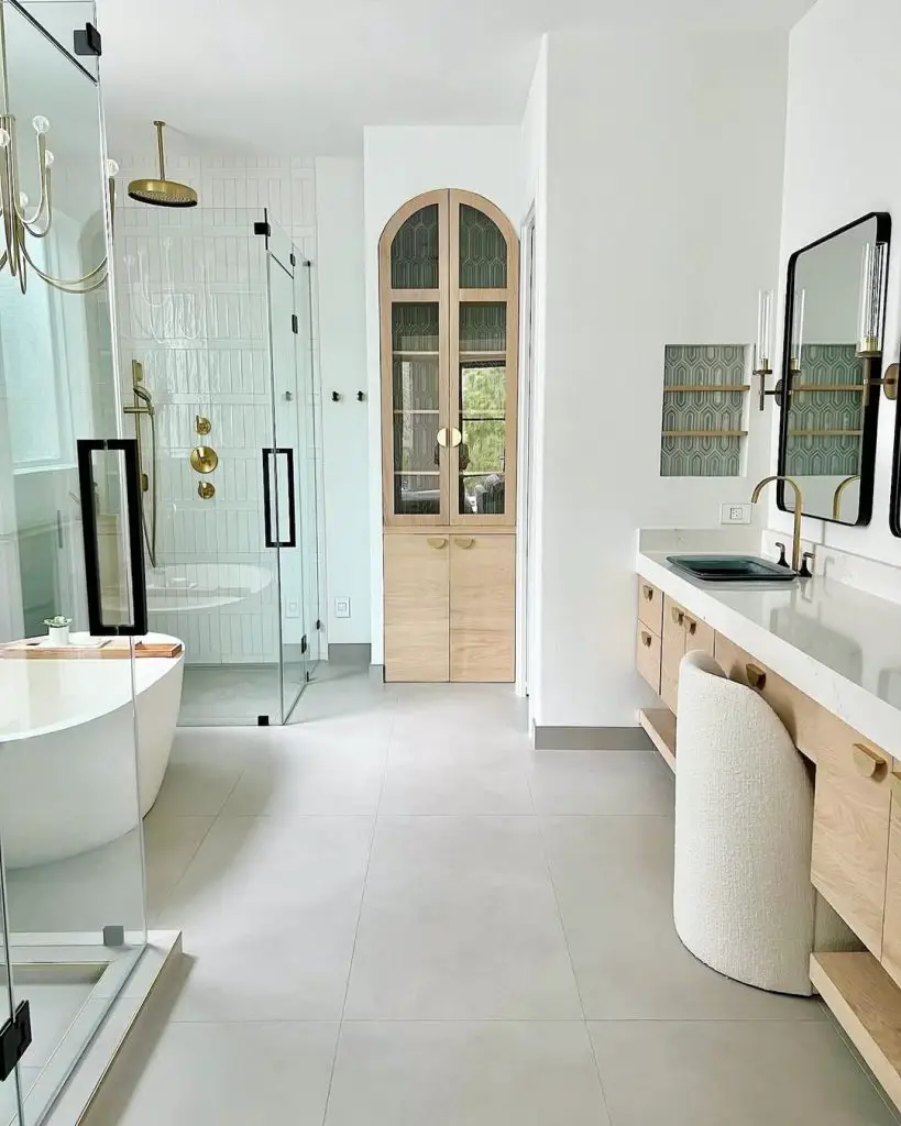 Modern bathroom with arched cabinet glass shower and wood vanity