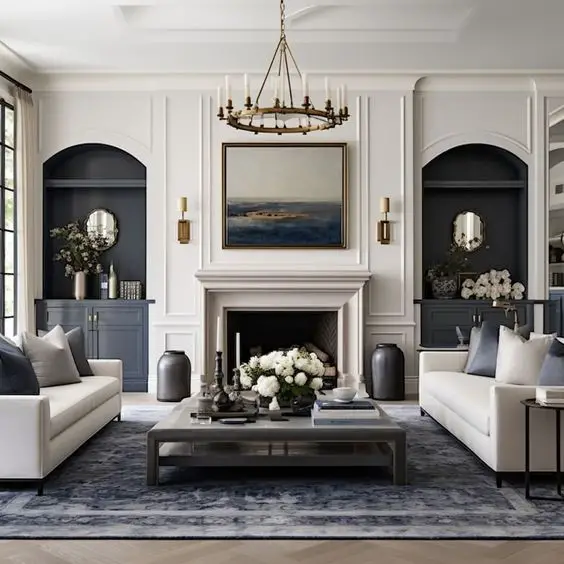 Modern classic living room with navy accents white sofas and brass lighting