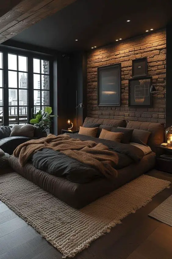 Modern bedroom with brick wall platform bed and large windows