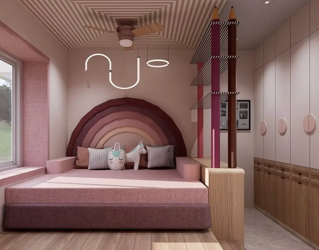 Modern kids bedroom with rainbow arch headboard and unicorn pillows