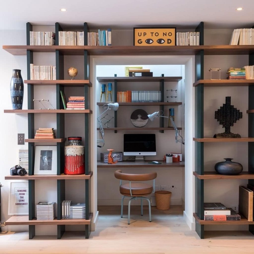 Minimalist home office with red maple tree and floating desk