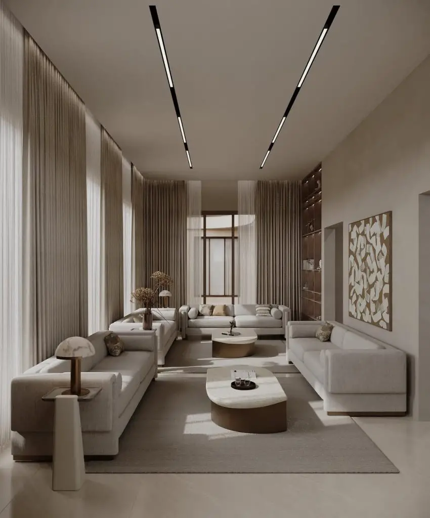 Modern cream colored living room with linear ceiling lights