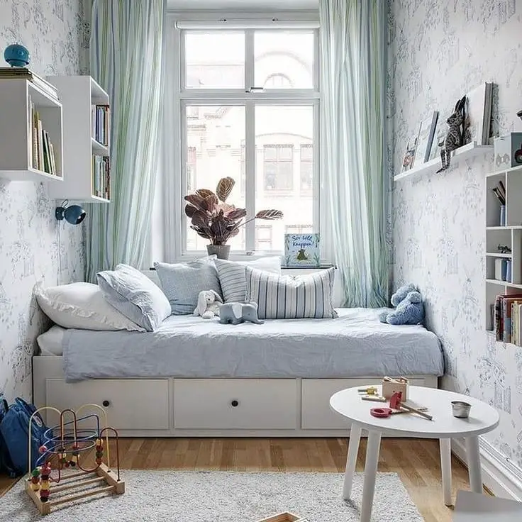 Kids bedroom with window seat built in storage and mint green curtains